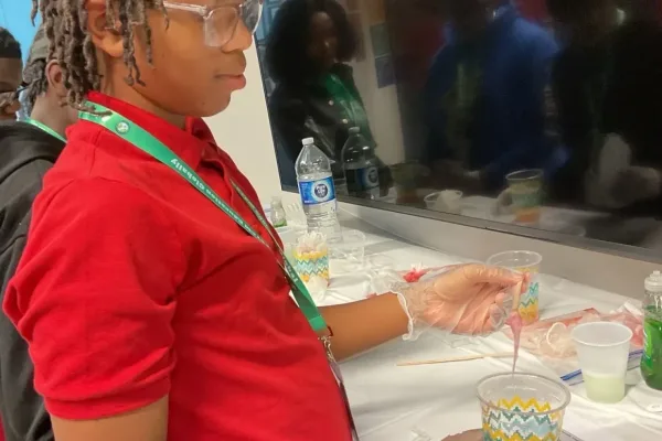 Students working on a DNA science experiment in the classroom